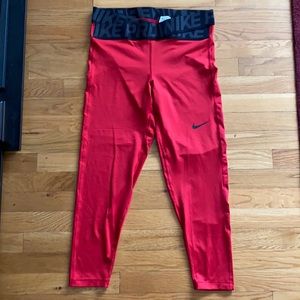 Red 7/8 Nike Pro leggings